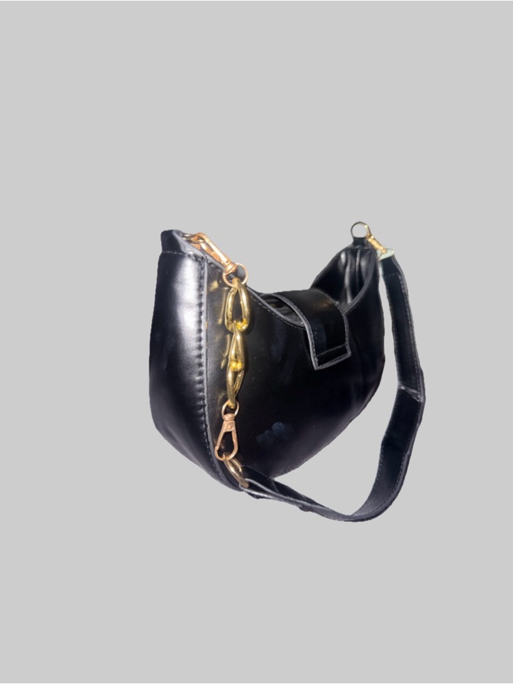 Classic Black Crescent Shoulder Bag with Gold Chain Accent